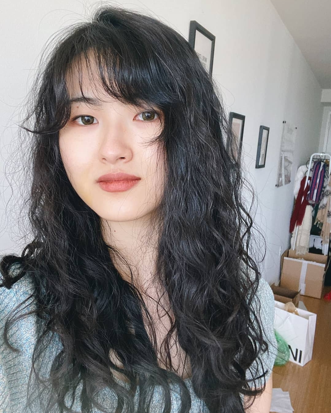 Sheep perm with voluminous fluffy spiral curls