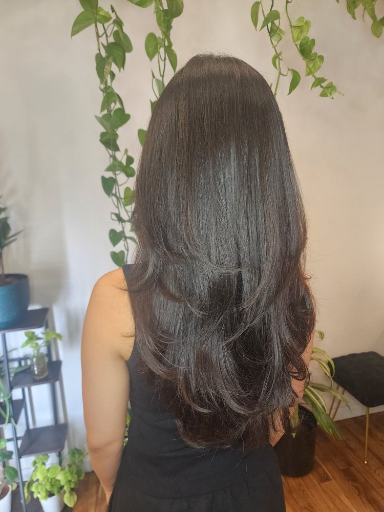 Layered cut on long dark hair